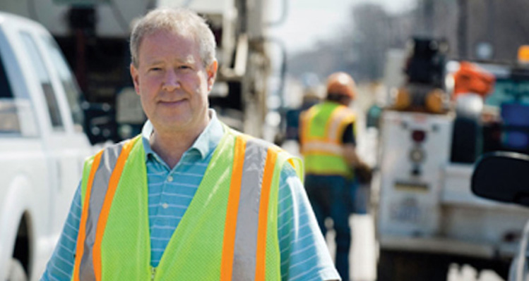 male public works worker in high-visibility vest