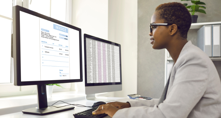 female working on computer in modern office