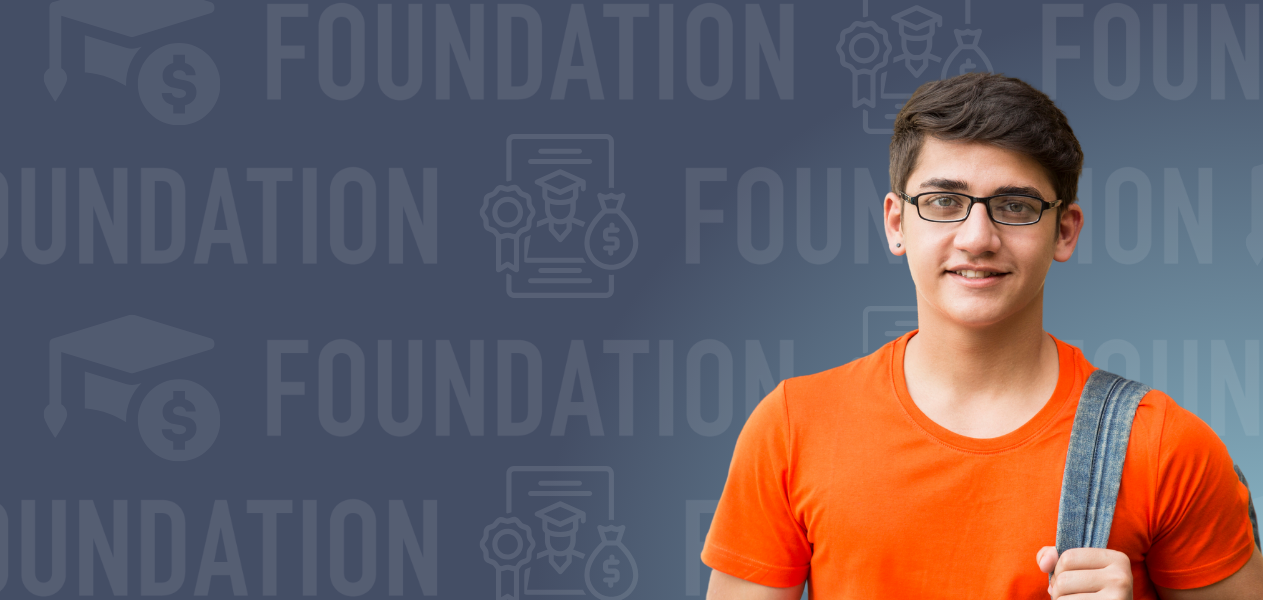 male student with backpack in front of a scholarship backdrop