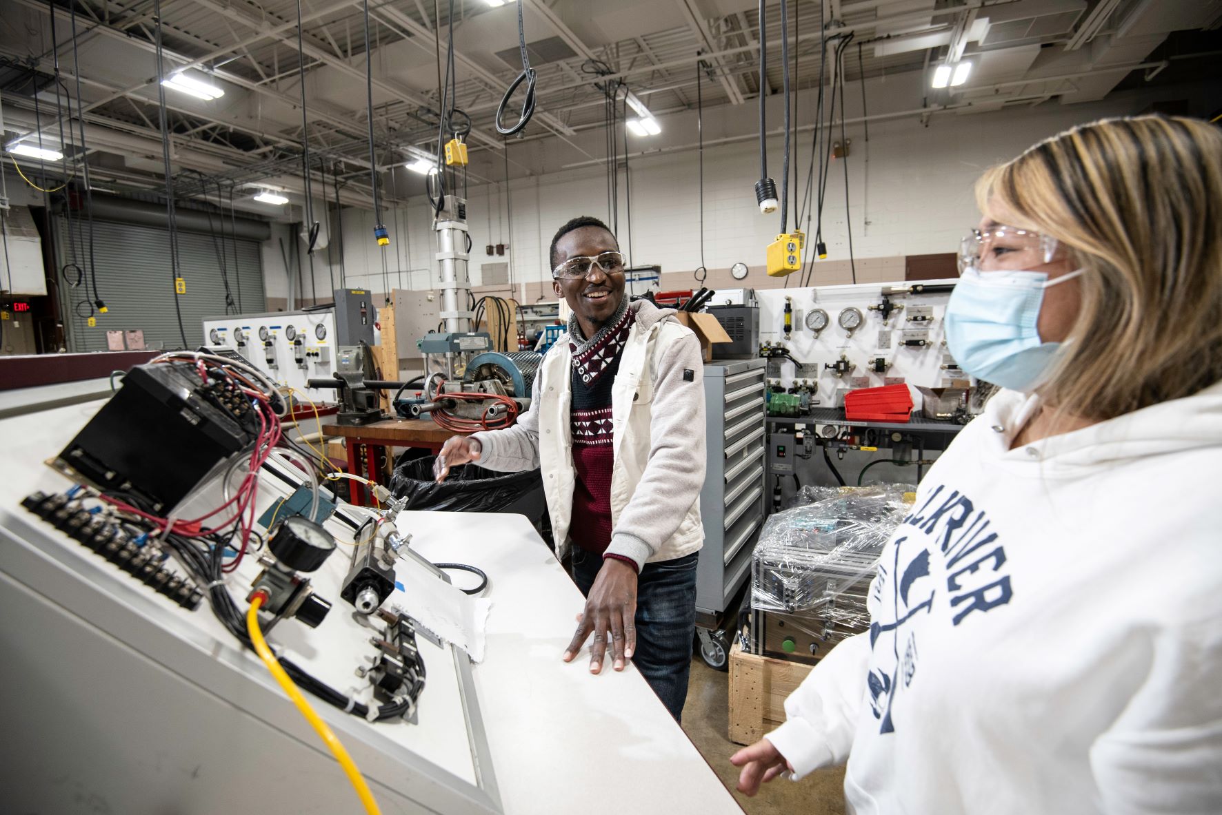 two students in Fluid Power lab