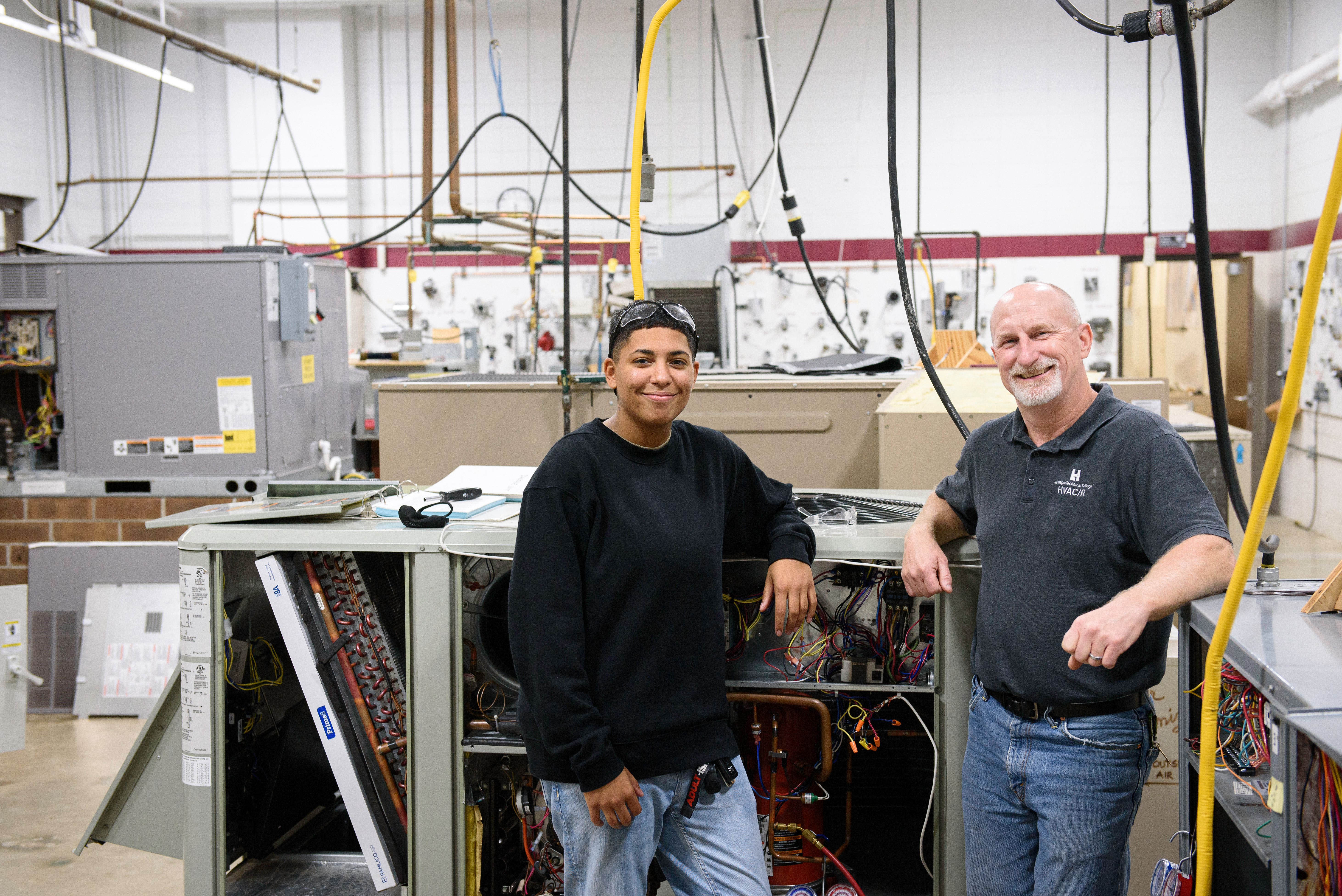 Student and faculty in HVAC lab