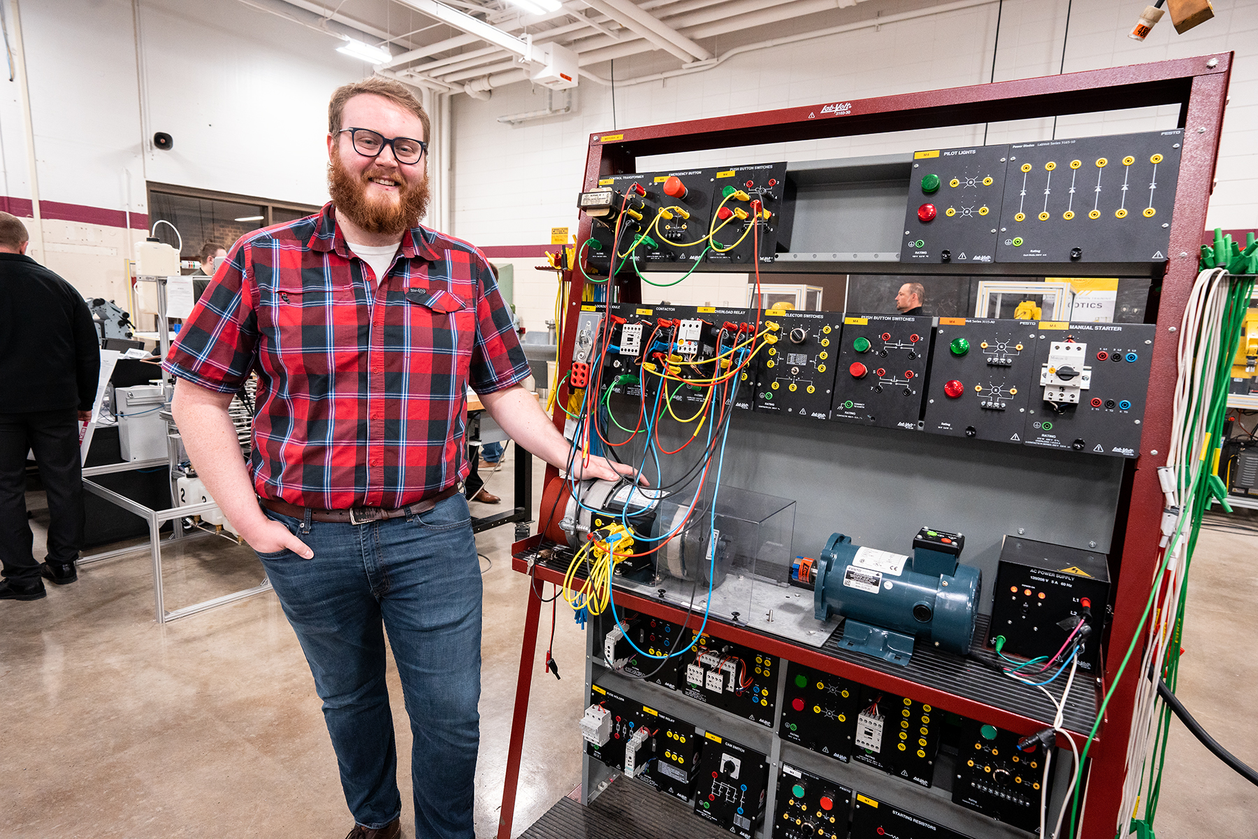 Male graduate of robotics program