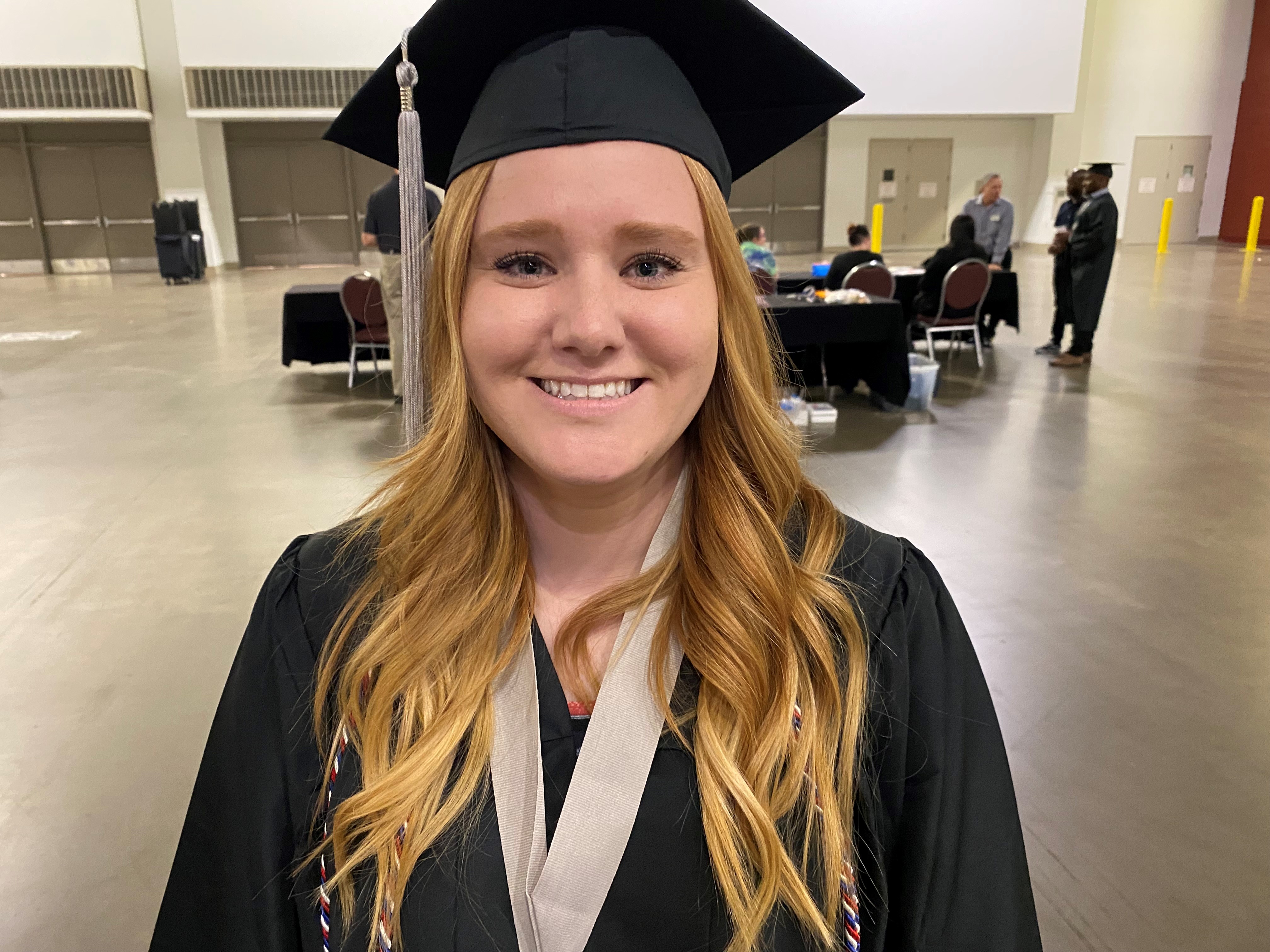 Female vet smiles on graduation day